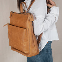 how to soften stiff leather bag 
