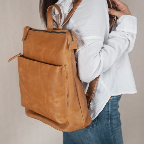 how to soften stiff leather bag 